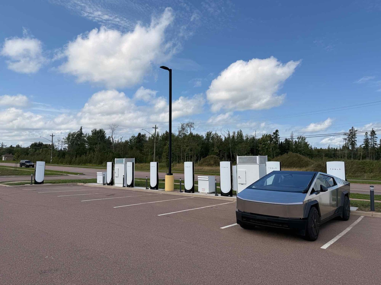 Tesla Opens Moncton Supercharger: 8 V4 Stalls, 325kW, Time-Based Pricing